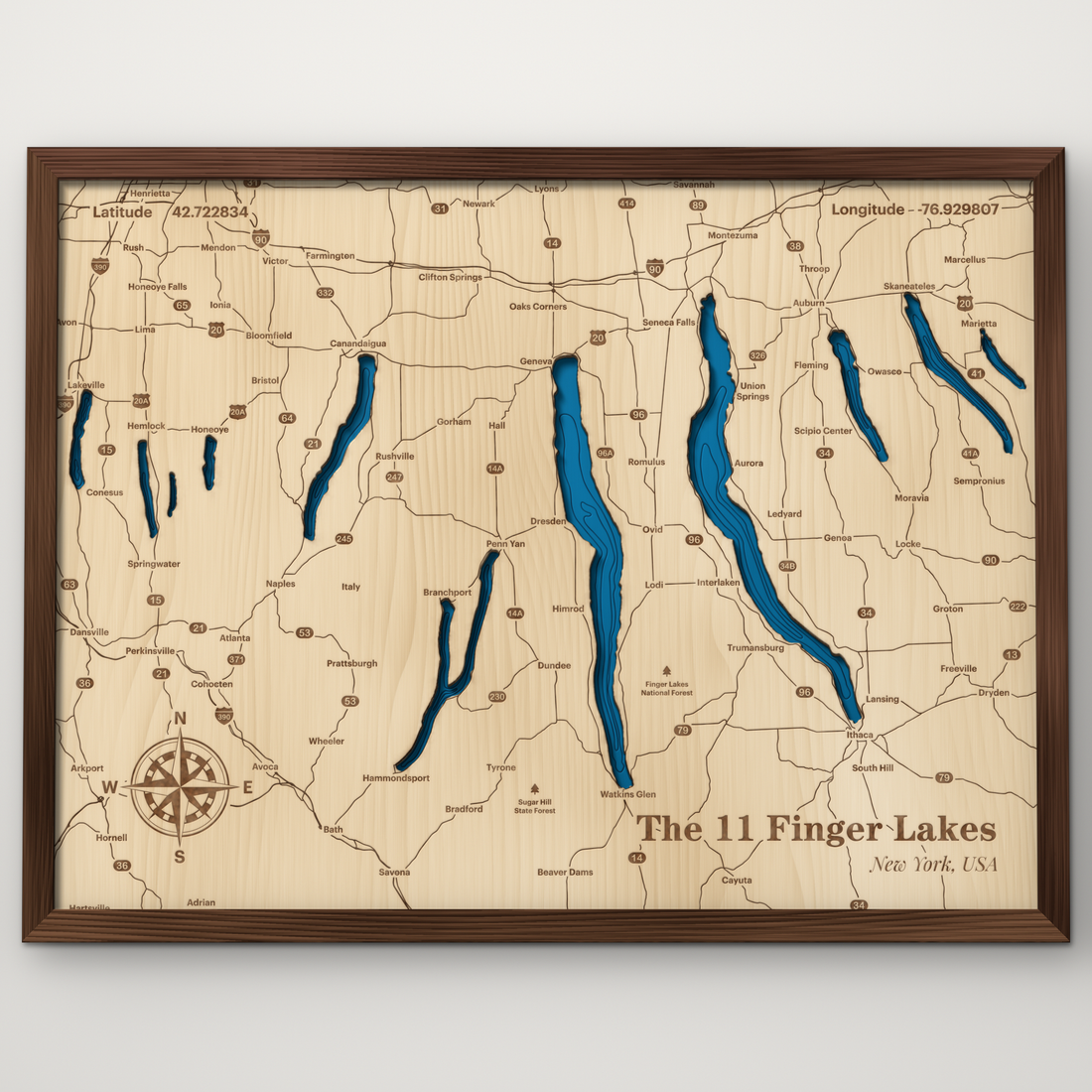The 11 Finger Lakes layered wood map in a stained walnut frame, handmade by Dirt Road Barns in Newark, NY