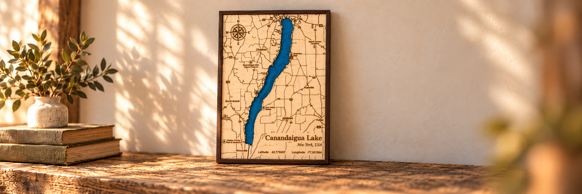 Layered wooden lake map in a walnut frame by Dirt Road Barns
