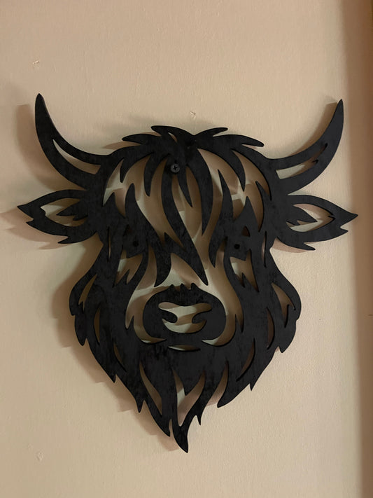 Highland Cow Wall Hanging, black painted maple plywood cutout of a shaggy Highland cow face hung on a wall | Dirt Road Barns