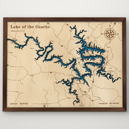 Lake of the Ozarks layered wood map in a stained walnut frame, showing the winding Magic Dragon shoreline in hand-painted blue on engraved maple