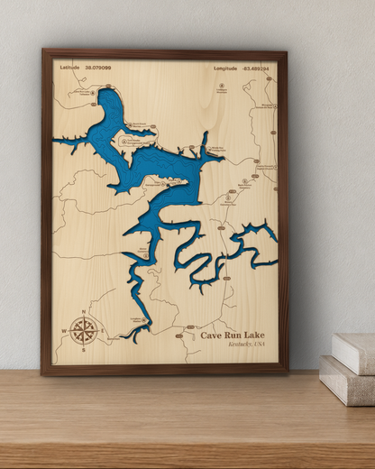 Cave Run Lake wood map in a walnut frame standing on a wooden sideboard against a wall for scale