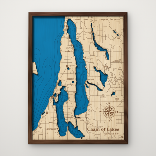 Chain of Lakes, Michigan, layered wood map with blue painted water and stained walnut frame, by Dirt Road Barns