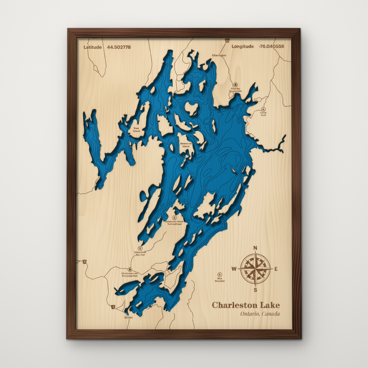 Charleston Lake, Ontario, layered wood map with blue painted water and stained walnut frame, by Dirt Road Barns
