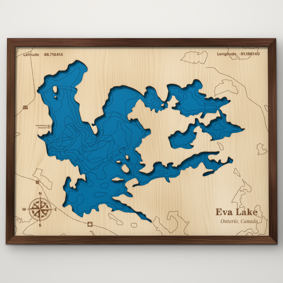 Eva Lake, Ontario, layered wood map with blue painted water and stained walnut frame, by Dirt Road Barns