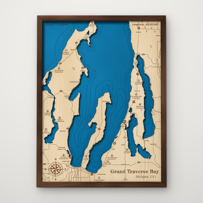 Grand Traverse Bay, Michigan, layered wood map with blue painted water and stained walnut frame, by Dirt Road Barns