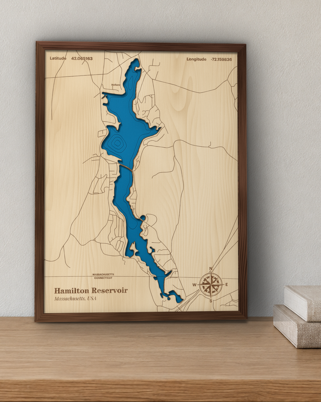 Hamilton Reservoir wood map in a walnut frame standing on a wooden sideboard against a wall for scale