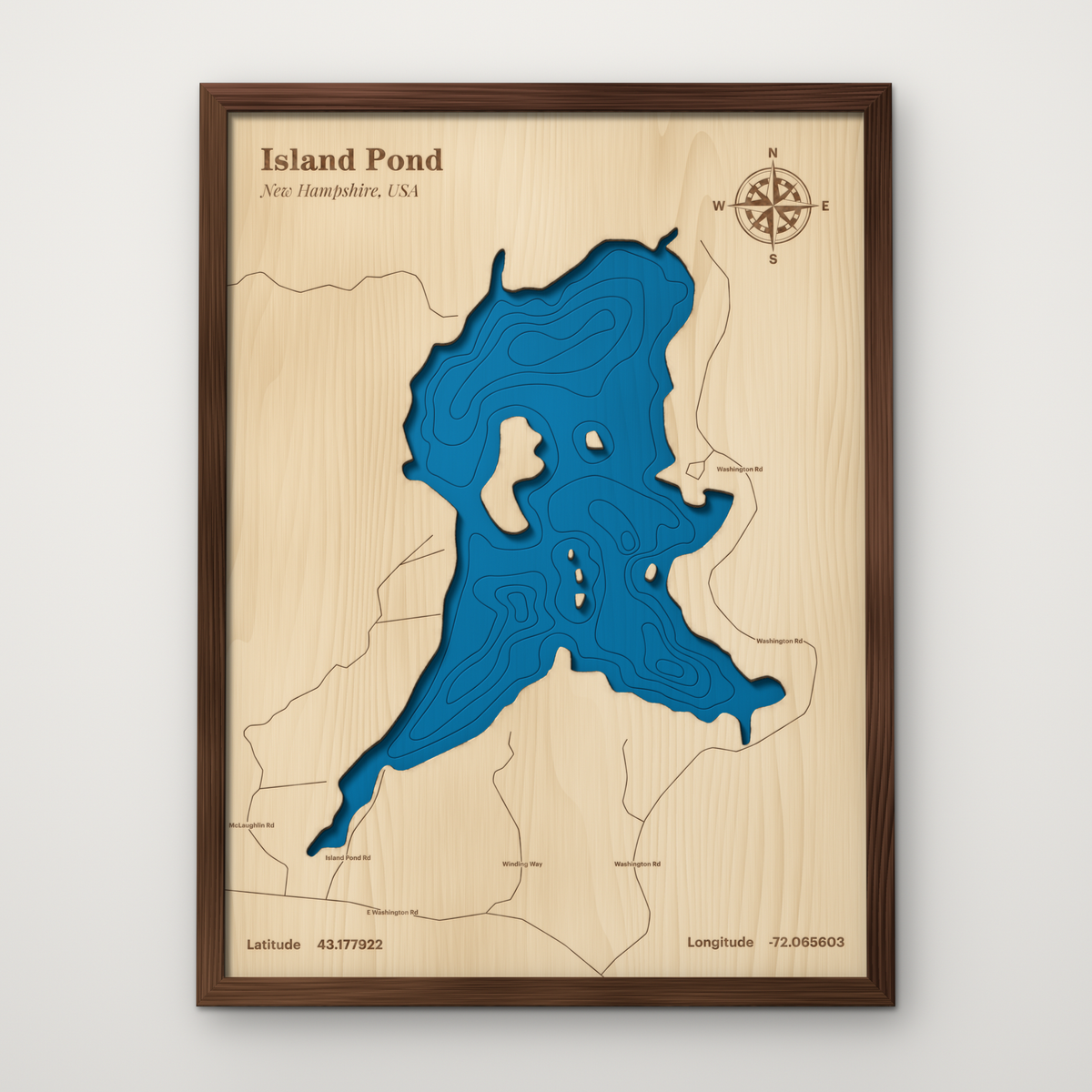 Island Pond, New Hampshire, layered wood map with blue painted water and stained walnut frame, by Dirt Road Barns