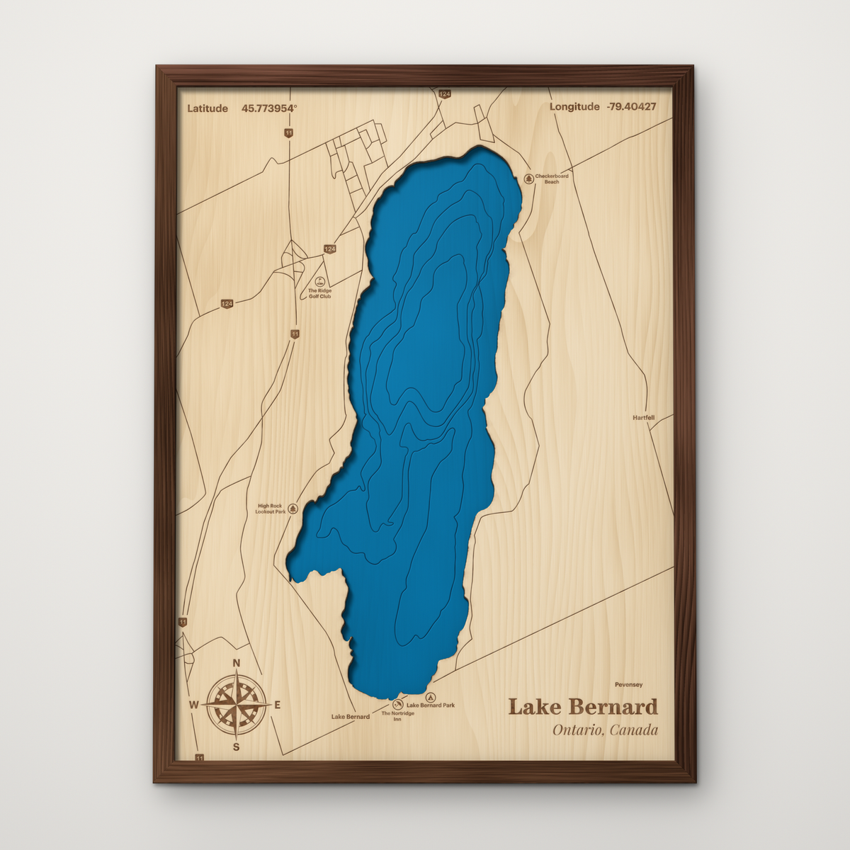 Lake Bernard, Ontario, layered wood map with blue painted water and stained walnut frame, by Dirt Road Barns