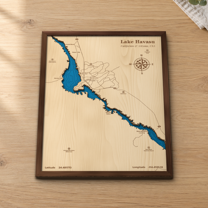 Lake Havasu wood map lying flat on a wooden tabletop, showing the long lake, Lake Havasu City and the depth contours