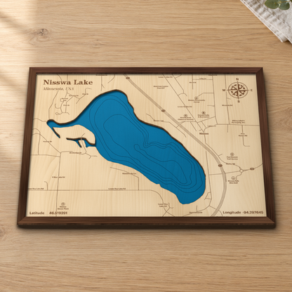 Nisswa Lake wood map lying flat on a wooden tabletop, showing the depth contours, downtown Nisswa and Highway 371 engraved in