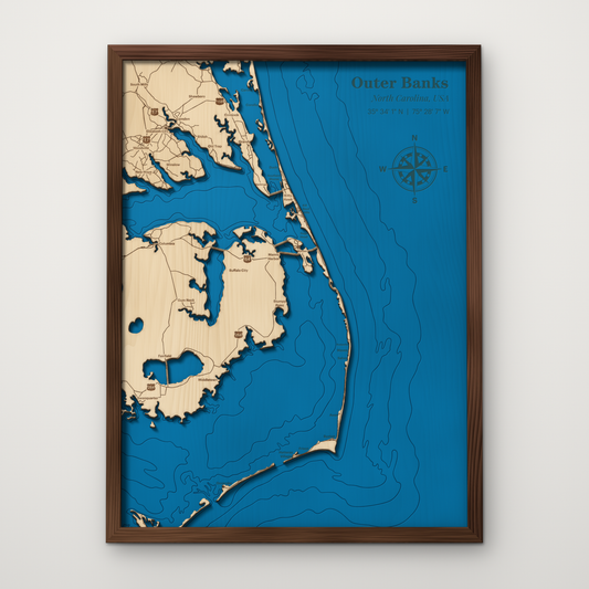Outer Banks layered wood map with the barrier islands cut in maple over blue painted water and a stained walnut frame, by Dirt Road Barns