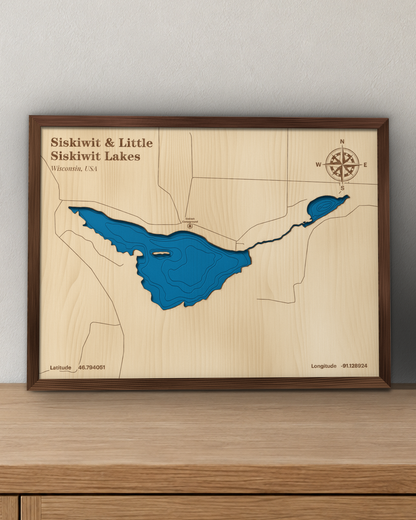 Siskiwit & Little Siskiwit Lakes wood map in a walnut frame standing on a wooden sideboard against a wall for scale