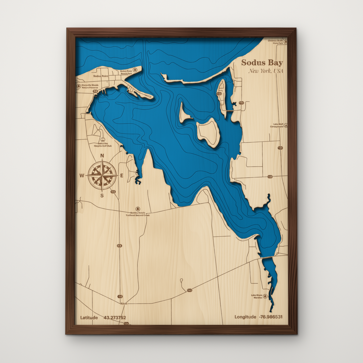 Sodus Bay layered wood map with blue painted Lake Ontario water and stained walnut frame, by Dirt Road Barns