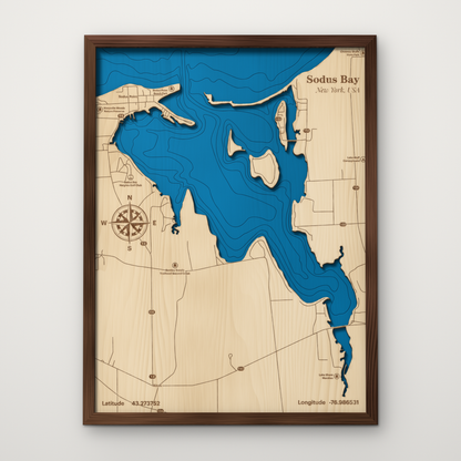 Sodus Bay layered wood map with blue painted Lake Ontario water and stained walnut frame, by Dirt Road Barns