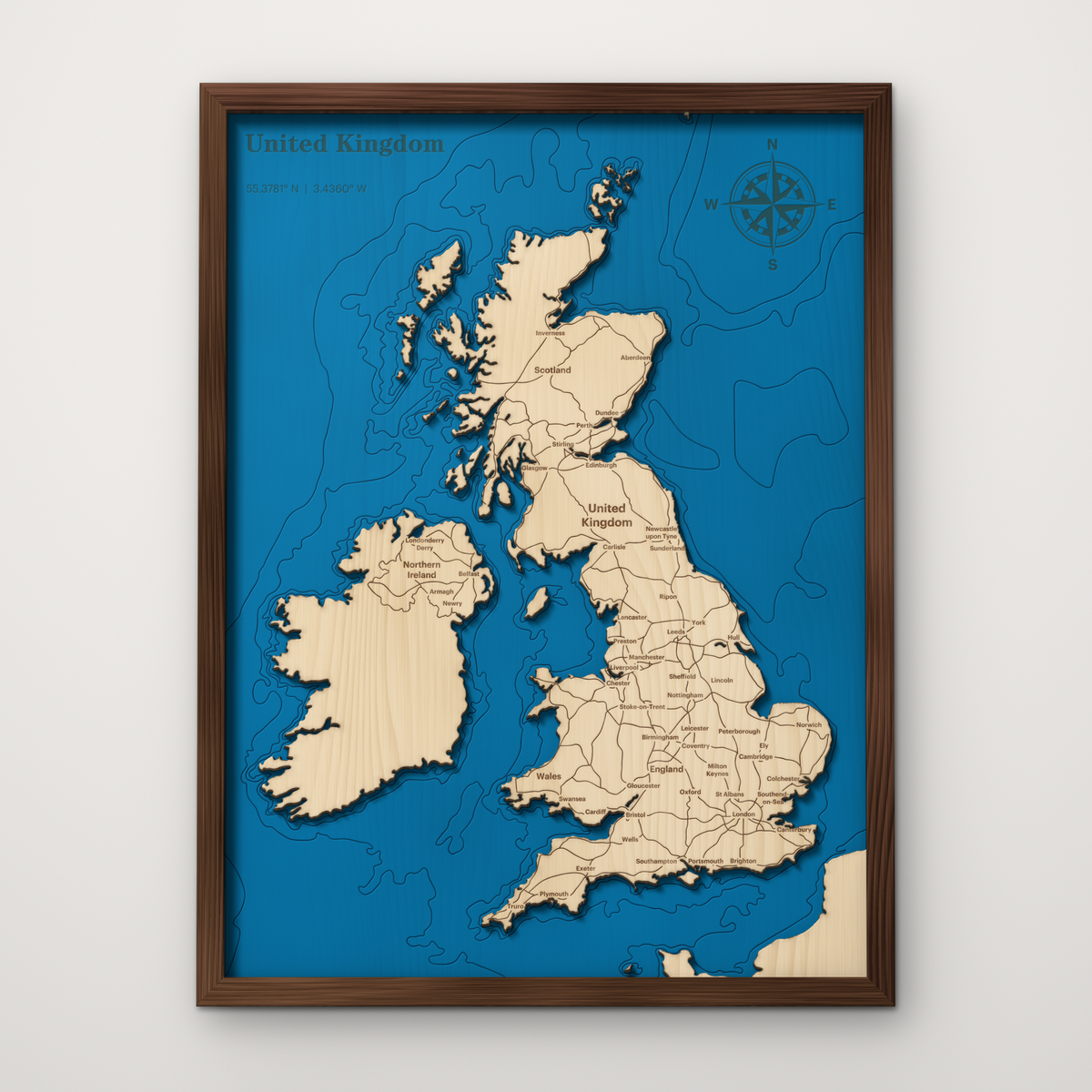 United Kingdom layered wood map with blue painted water and stained walnut frame, by Dirt Road Barns