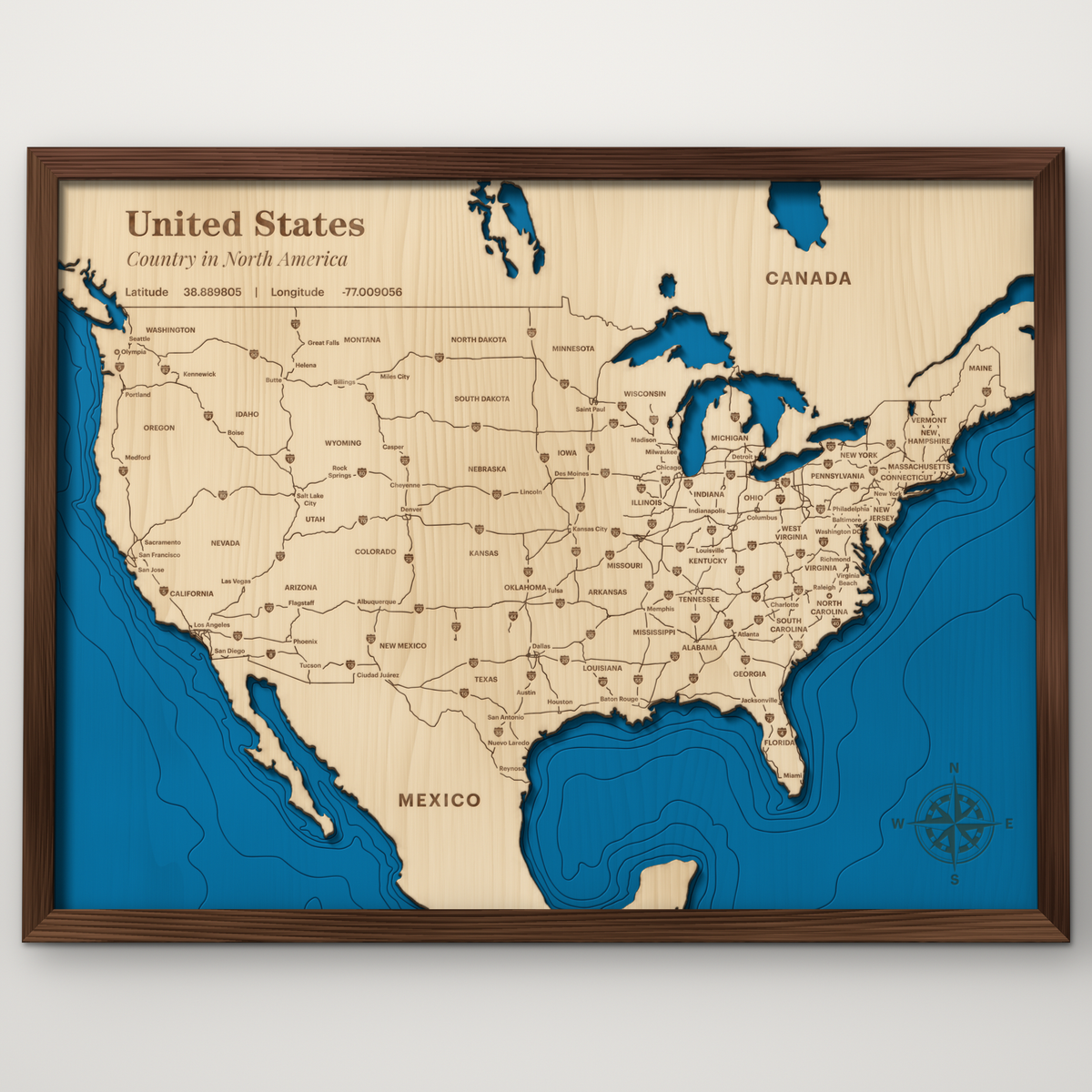 United States lower 48 layered wood map with blue painted ocean and stained walnut frame, by Dirt Road Barns