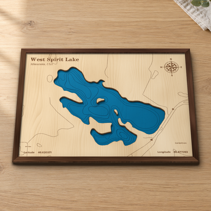 West Spirit Lake wood map lying flat on a wooden tabletop, showing the depth contours and County Road 4 engraved in